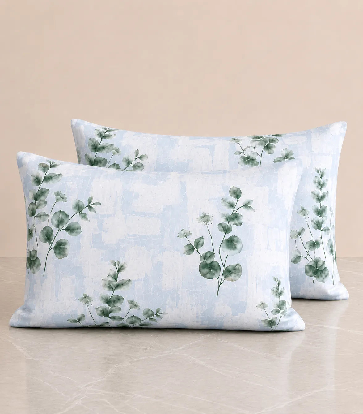 Arizona Sage Mist eucalyptus print cotton pillow covers featuring a soft blue watercolor background and elegant botanical leaf design.