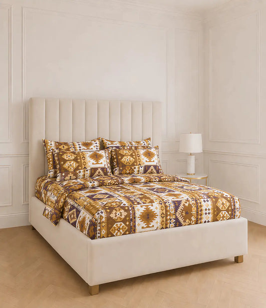 Premium king size 100% cotton bedsheet featuring a mustard, brown, ivory, and deep purple tribal geometric print with matching pillow covers in a modern bedroom.