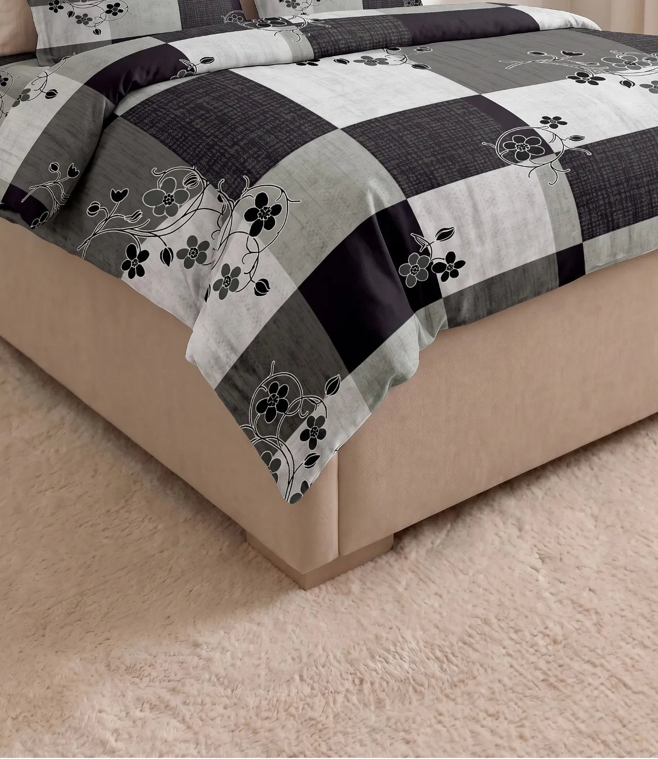 Close-up of a premium 100% pure cotton charcoal grey and light grey checkered bedsheet highlighting elegant black floral vine motifs, breathable cotton weave, soft texture, smooth drape, and luxurious finish.