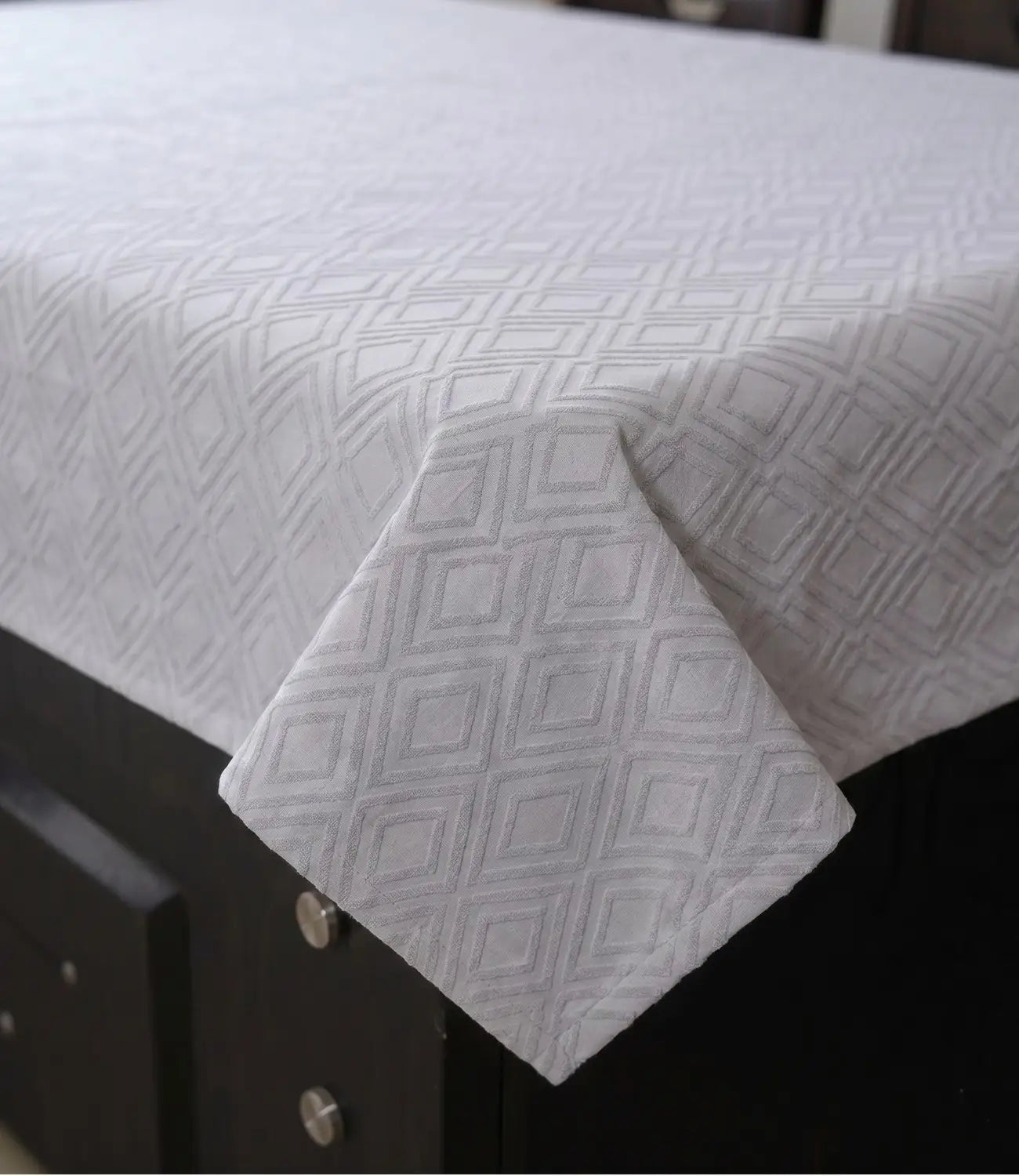 Close-up of Mayra silver grey cotton bedsheet showcasing soft premium fabric and elegant geometric diamond design.
