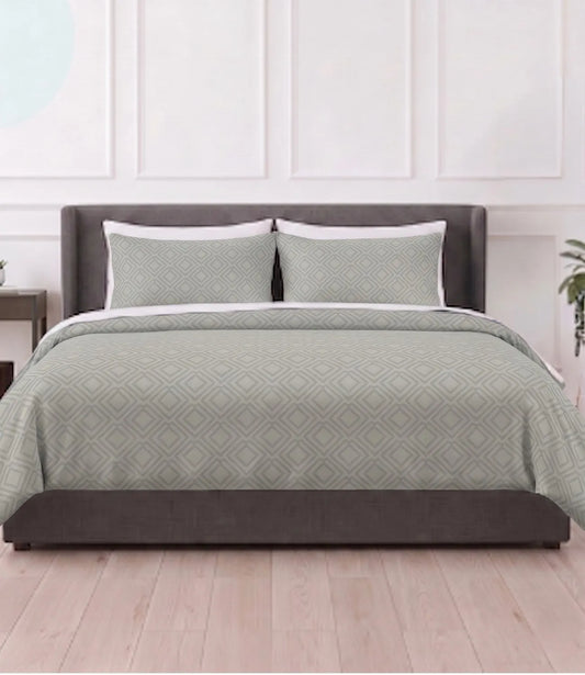 Mayra tea green king size cotton bedsheet with matching pillow covers featuring a modern geometric diamond pattern in a contemporary bedroom.