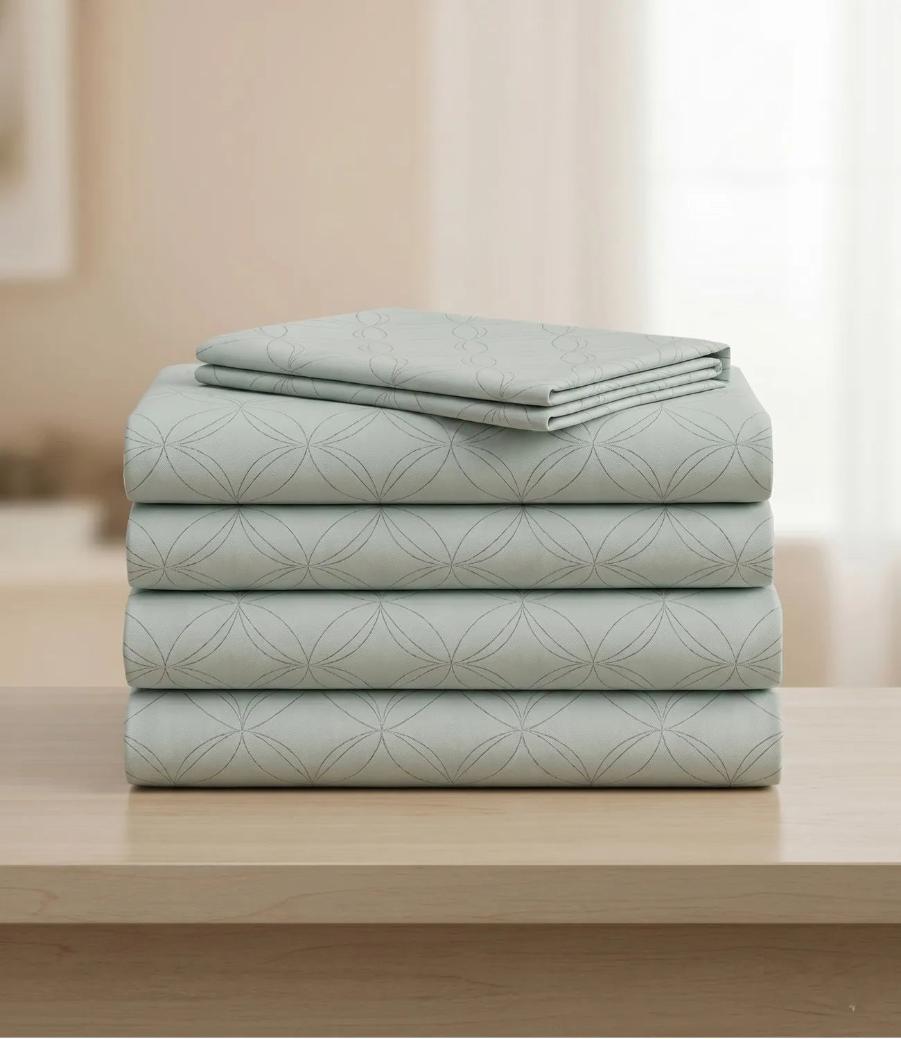 Folded king size 100% pure cotton tea green geometric bedsheet showcasing breathable cotton fabric, subtle circular pattern, premium craftsmanship, durable stitching, and long-lasting comfort.