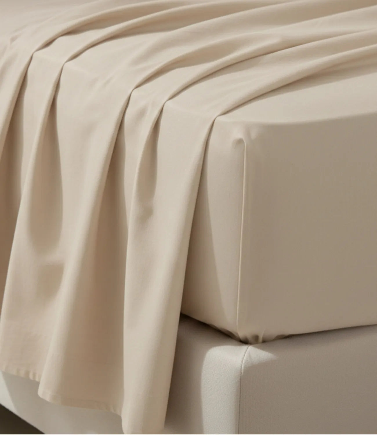Close-up of Soft Heaven pearl white king size cotton bedsheet showing smooth breathable fabric, elegant drape, fine stitching, and premium quality finish.