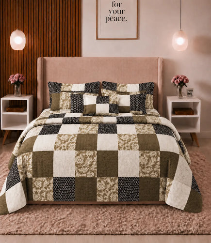 Premium queen size 100% cotton bedsheet with an elegant olive, beige, cream, and black patchwork design, styled in a modern luxury bedroom with matching pillow covers.