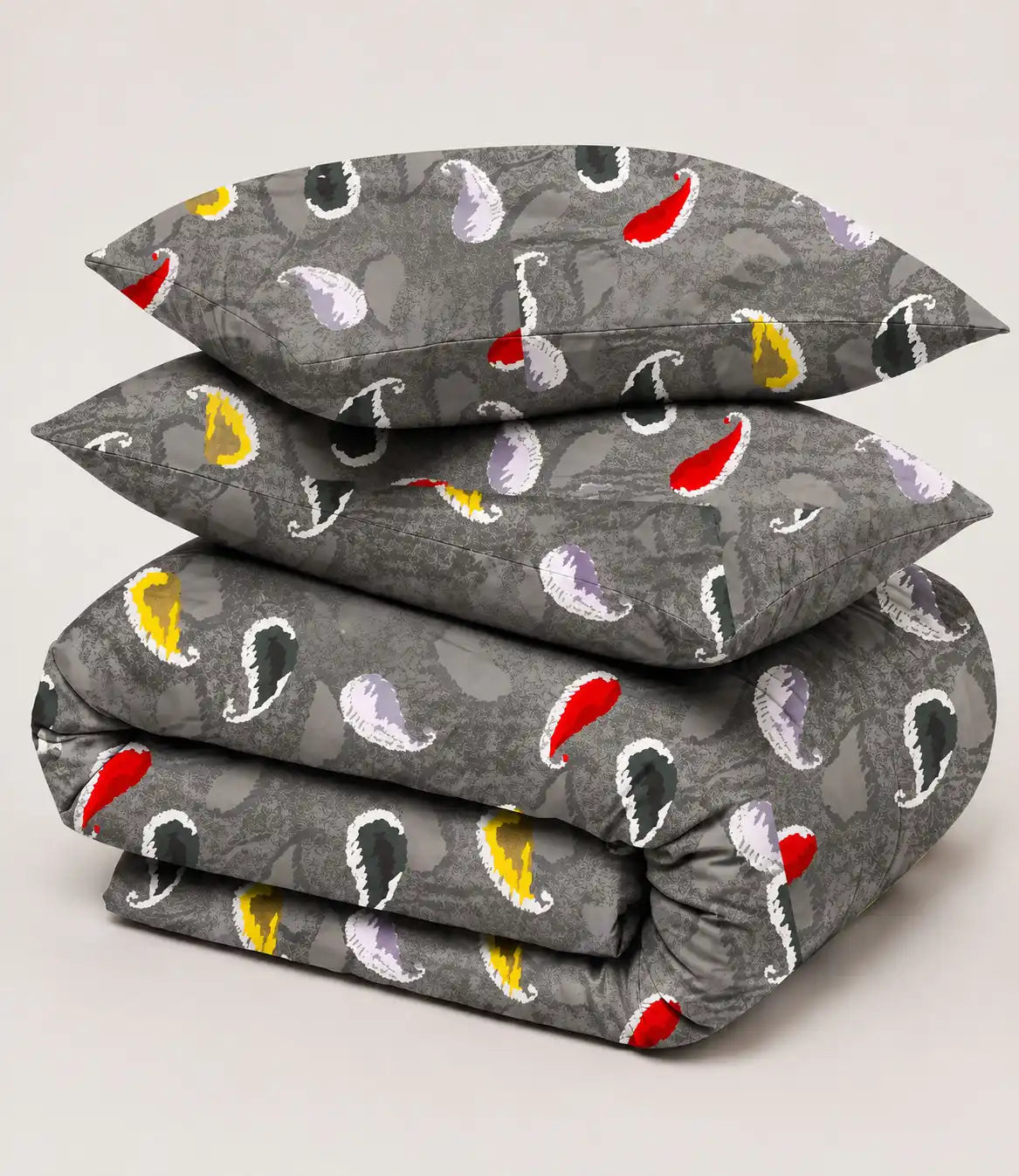 Folded premium king size 100% cotton bedsheet showcasing a charcoal grey multicolor paisley design with soft, breathable cotton fabric.