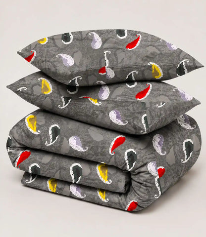 Folded premium king size 100% cotton bedsheet showcasing a charcoal grey multicolor paisley design with soft, breathable cotton fabric.
