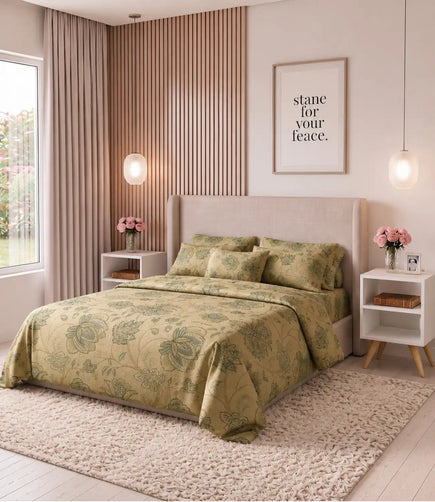 Premium beige cotton bedsheet featuring a vintage floral garden pattern on a king size bed in a luxury bedroom with wooden accent wall, pendant lights, and neutral décor.