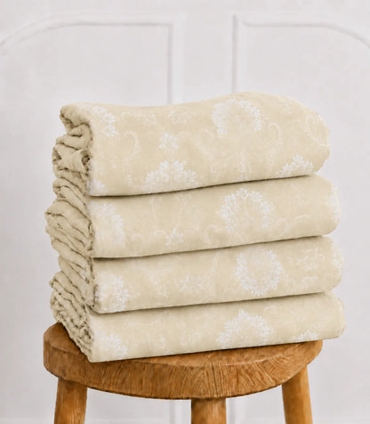Folded King Size ivory beige floral vine cotton bedsheet set showcasing soft fabric, premium finish, and delicate white floral vine print.