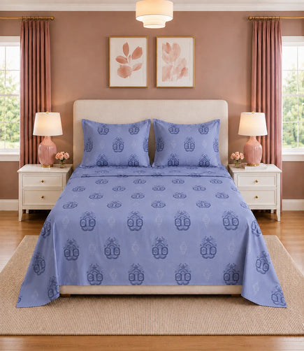Front view of a lavender king size cotton bedsheet featuring intricate medallion motifs and matching pillow covers, creating a clean and elegant bedroom setting.