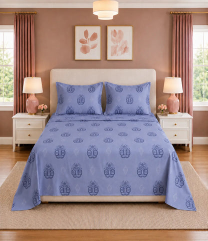 Front view of a lavender king size cotton bedsheet featuring intricate medallion motifs and matching pillow covers, creating a clean and elegant bedroom setting.