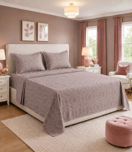 Blush mauve king size cotton bedsheet with interwoven geometric pattern styled on a luxury bedroom bed with matching pillow covers.
