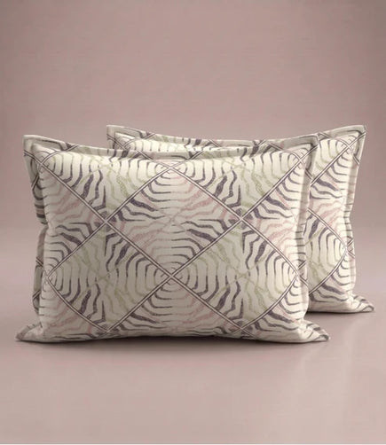Matching 100% pure cotton pillow covers featuring a contemporary abstract wave geometric pattern in blush pink, ivory, sage green, and charcoal grey for a modern bedroom.