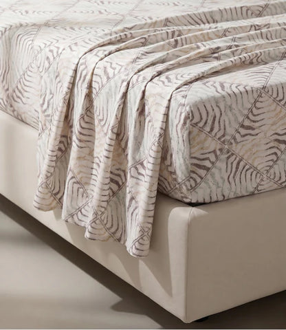 Close-up of a premium 100% pure cotton bedsheet with an elegant ivory and taupe abstract geometric stripe pattern, highlighting its soft texture, smooth weave, and breathable cotton fabric.