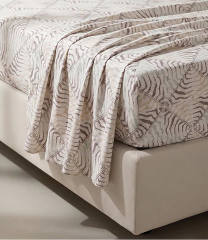Close-up of a premium 100% pure cotton bedsheet with an elegant beige and taupe geometric abstract pattern, highlighting its soft texture and breathable fabric.