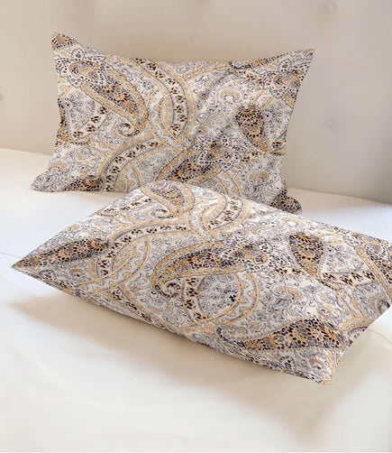Matching 100% pure cotton pillow covers with intricate beige paisley patterns in brown, grey, and ivory, offering a sophisticated heritage-inspired design and premium comfort.