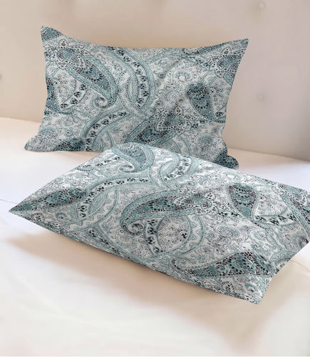 Matching 100% pure cotton pillow covers showcasing an elegant sky blue paisley design with intricate traditional motifs in blue, grey, and ivory, offering breathable comfort and timeless sophistication.