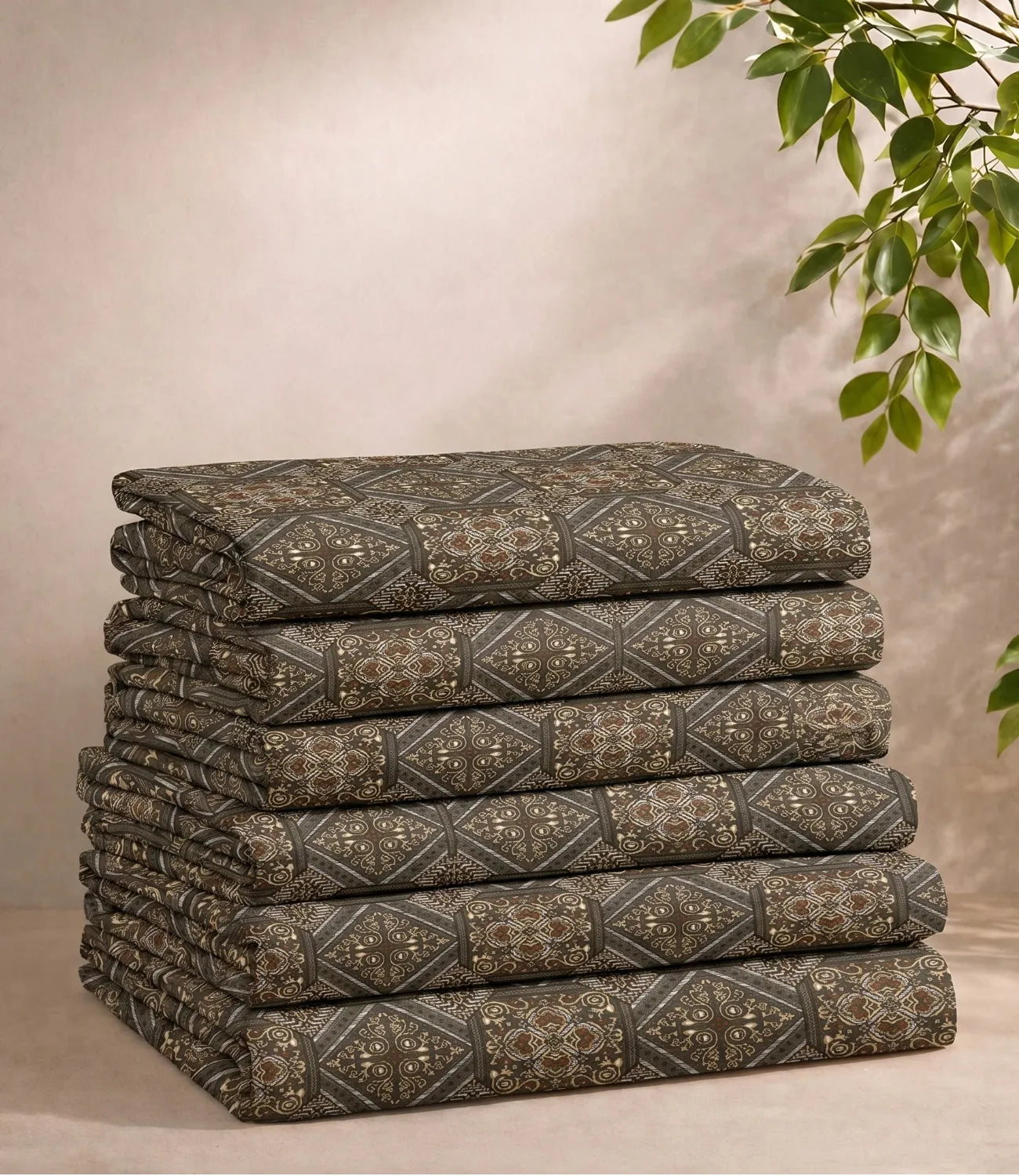 Folded queen size 100% pure cotton taupe geometric mosaic bedsheet showcasing an elegant heritage-inspired print, breathable cotton fabric, soft texture, premium craftsmanship, and long-lasting comfort.