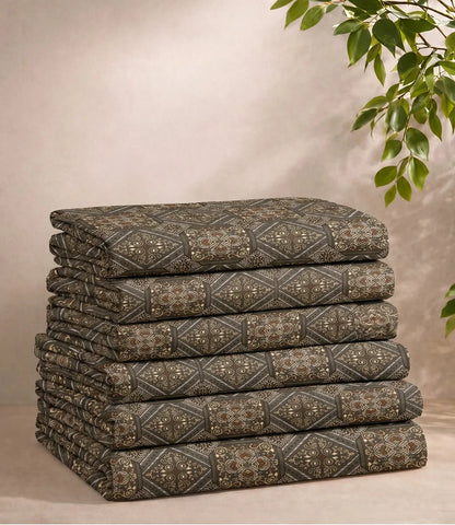 Folded queen size 100% pure cotton taupe geometric mosaic bedsheet showcasing an elegant heritage-inspired print, breathable cotton fabric, soft texture, premium craftsmanship, and long-lasting comfort.