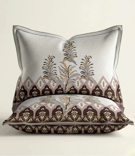 Matching 100% cotton pillow cover featuring a coffee brown botanical print with decorative border on a soft white background.