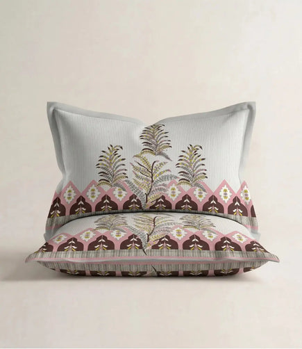 Matching 100% cotton pillow cover featuring a rose brown botanical print with decorative border on a soft white background.