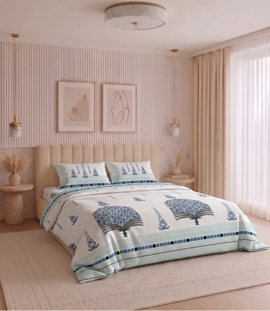 Premium king size 100% cotton bedsheet with a royal blue traditional tree print and matching pillow covers styled in a modern luxury bedroom.