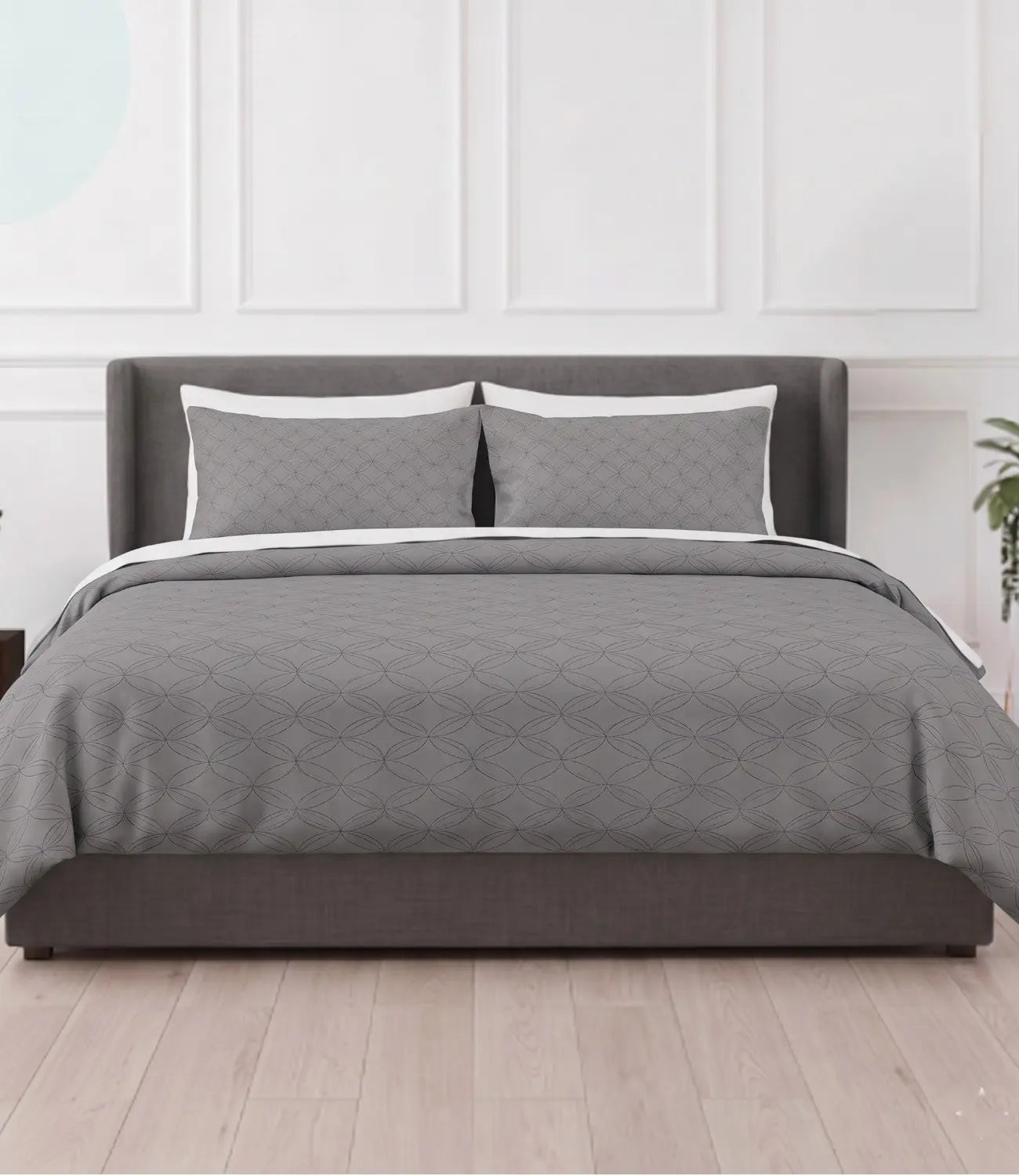 Premium king size 100% pure cotton dark grey geometric bedsheet with matching pillow covers, styled in a modern bedroom featuring breathable fabric, soft texture, and elegant contemporary design.