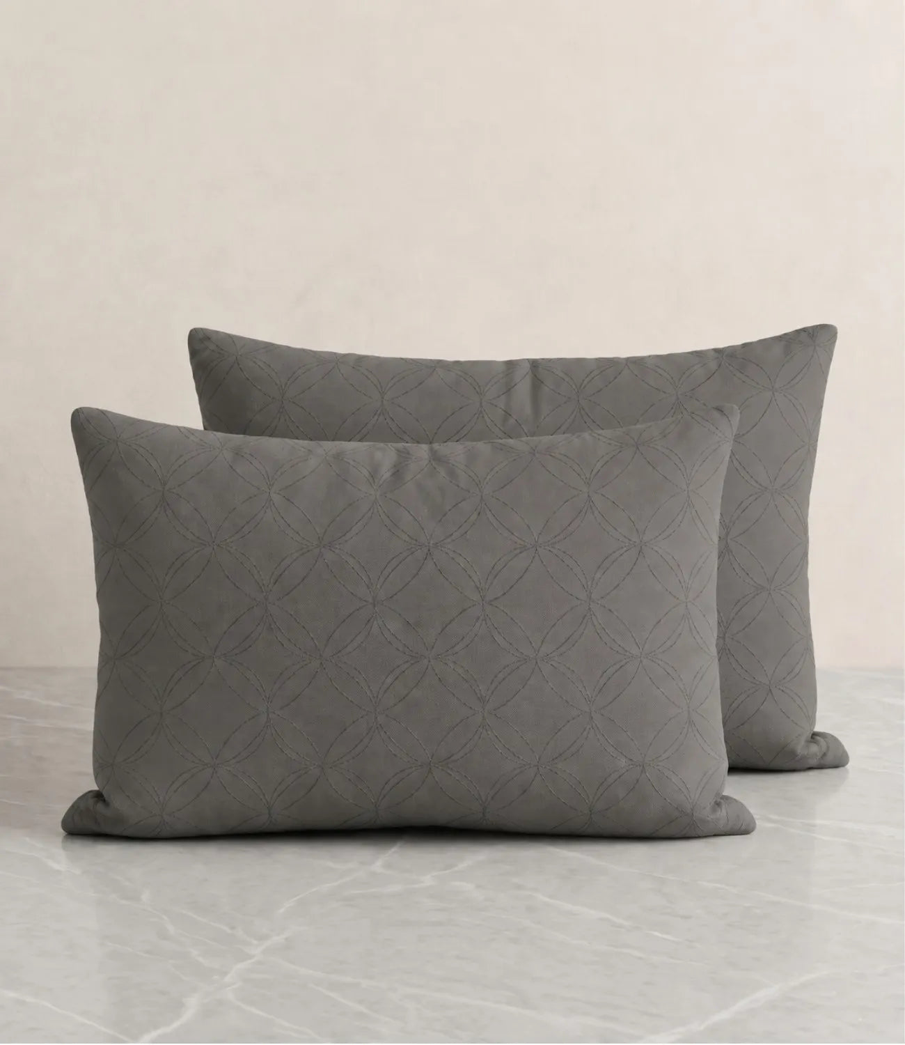 Matching 100% pure cotton dark grey geometric pillow covers featuring a subtle circular pattern, breathable fabric, premium stitching, and soft everyday comfort.