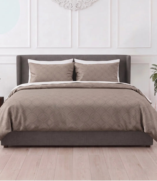 Premium king size 100% pure cotton mocha brown geometric bedsheet with matching pillow covers, styled in a modern bedroom featuring breathable fabric, soft texture, and an elegant contemporary circular pattern.