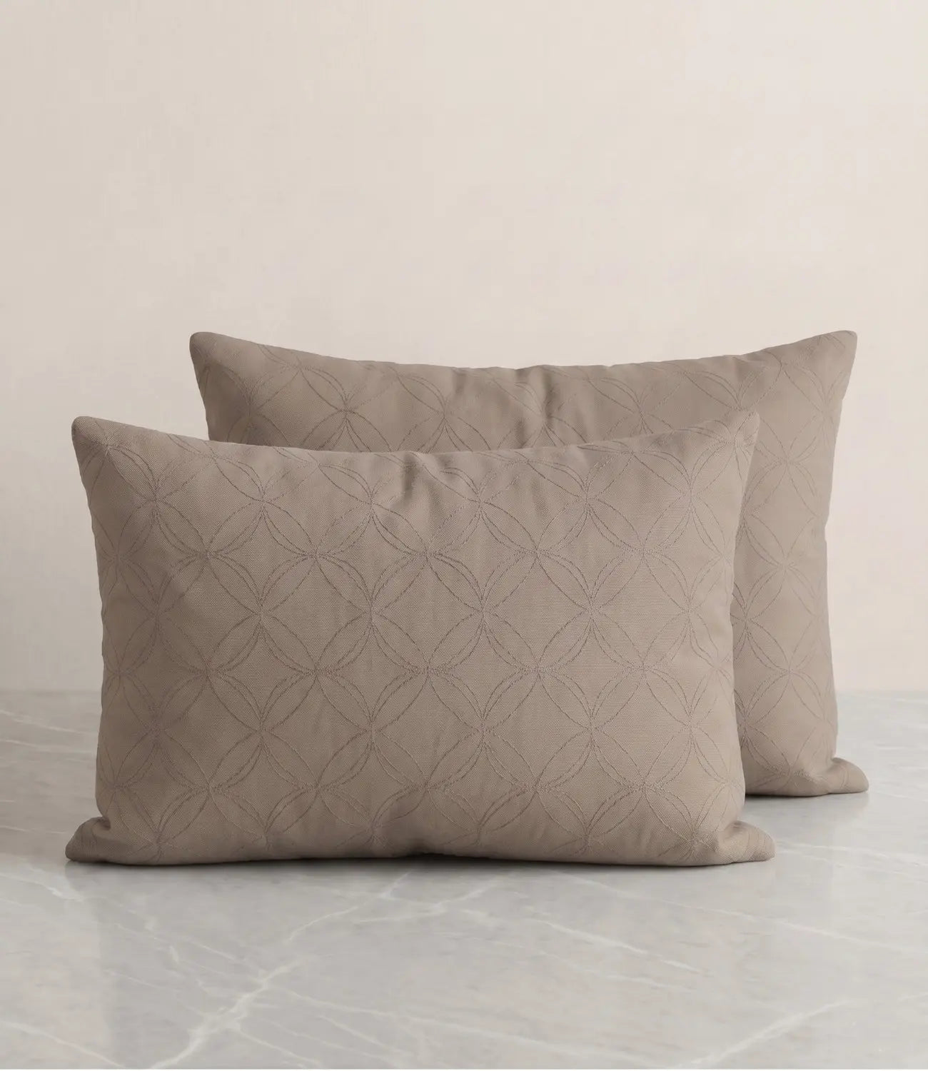 Matching 100% pure cotton mocha brown geometric pillow covers featuring a subtle circular pattern, breathable fabric, premium stitching, and soft everyday comfort.