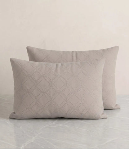 Matching 100% pure cotton pearl white geometric pillow covers featuring a subtle circular pattern, breathable fabric, premium stitching, and soft everyday comfort.