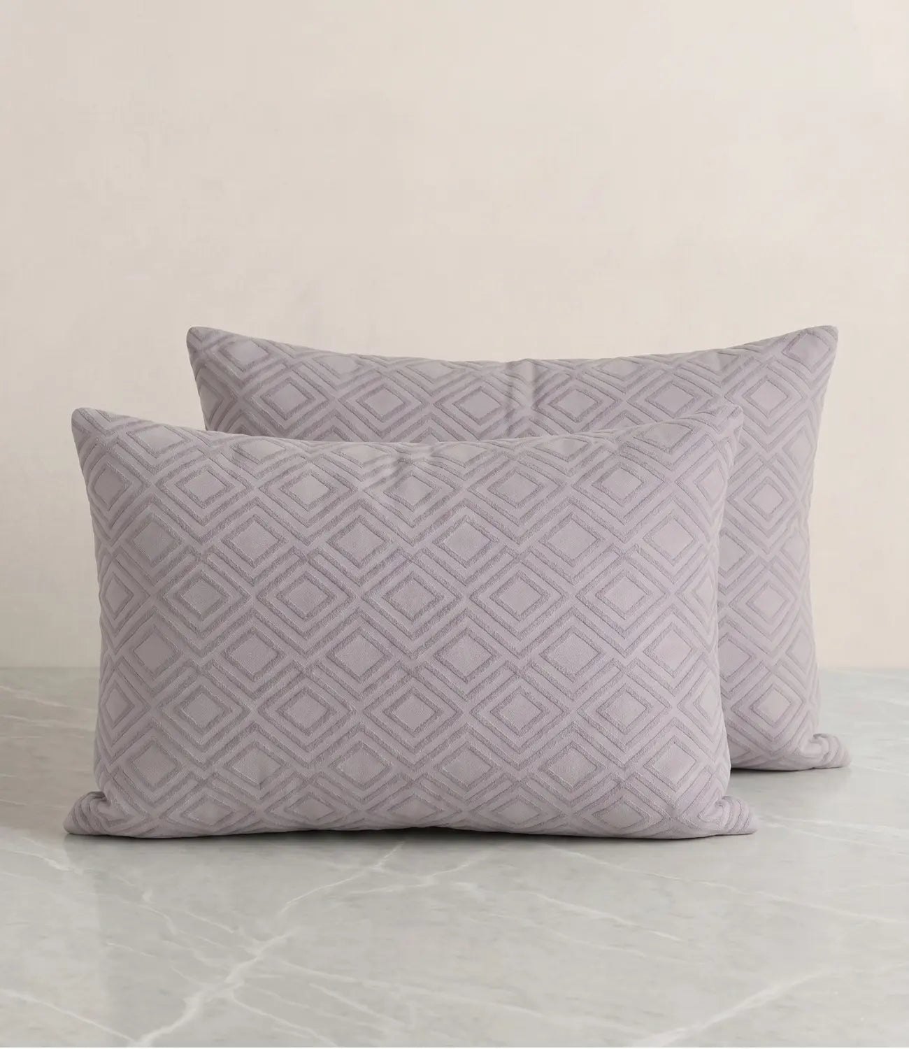 Pair of Mayra silver grey cotton pillow covers with elegant geometric diamond pattern for modern bedroom décor.