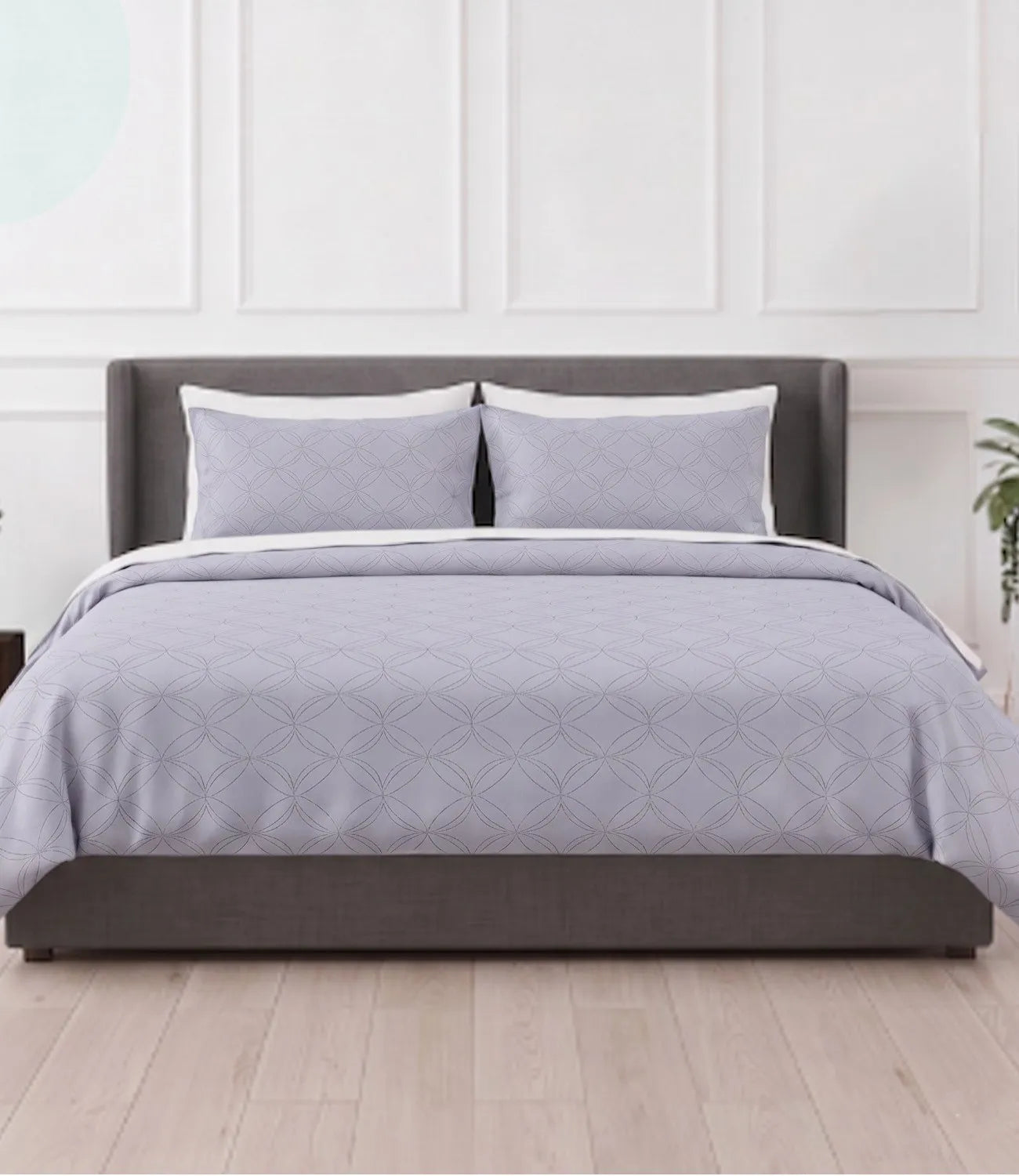Premium king size 100% pure cotton silver grey geometric bedsheet with matching pillow covers, styled in a modern bedroom featuring breathable fabric, soft texture, and an elegant minimal circular pattern.