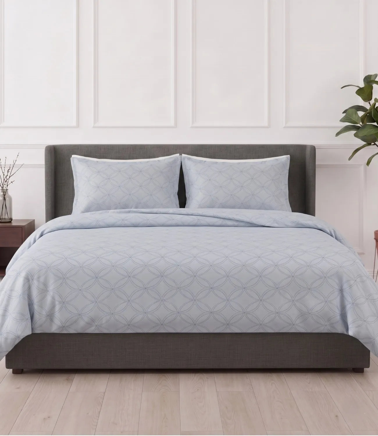 Premium king size 100% pure cotton slate blue geometric bedsheet with matching pillow covers, styled in a modern bedroom featuring breathable fabric, soft texture, and an elegant circular pattern.