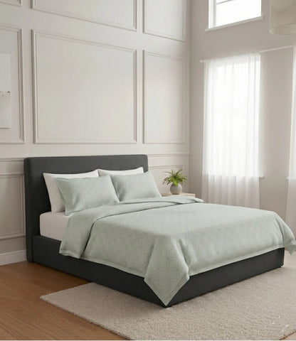 Premium king size 100% pure cotton tea green geometric bedsheet with matching pillow covers, displayed in a contemporary luxury bedroom for a fresh, minimal, and hotel-inspired bedding experience.