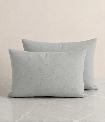 Matching 100% pure cotton tea green geometric pillow covers featuring a subtle circular pattern, breathable fabric, premium stitching, and soft everyday comfort.