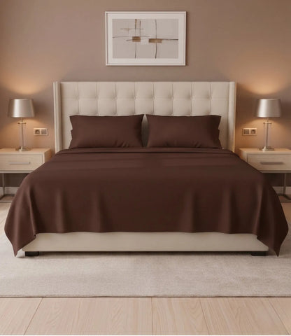 Premium coffee brown king size cotton bedsheet neatly spread on a king bed with matching pillow covers, showcasing a smooth, luxurious, and minimalist look.