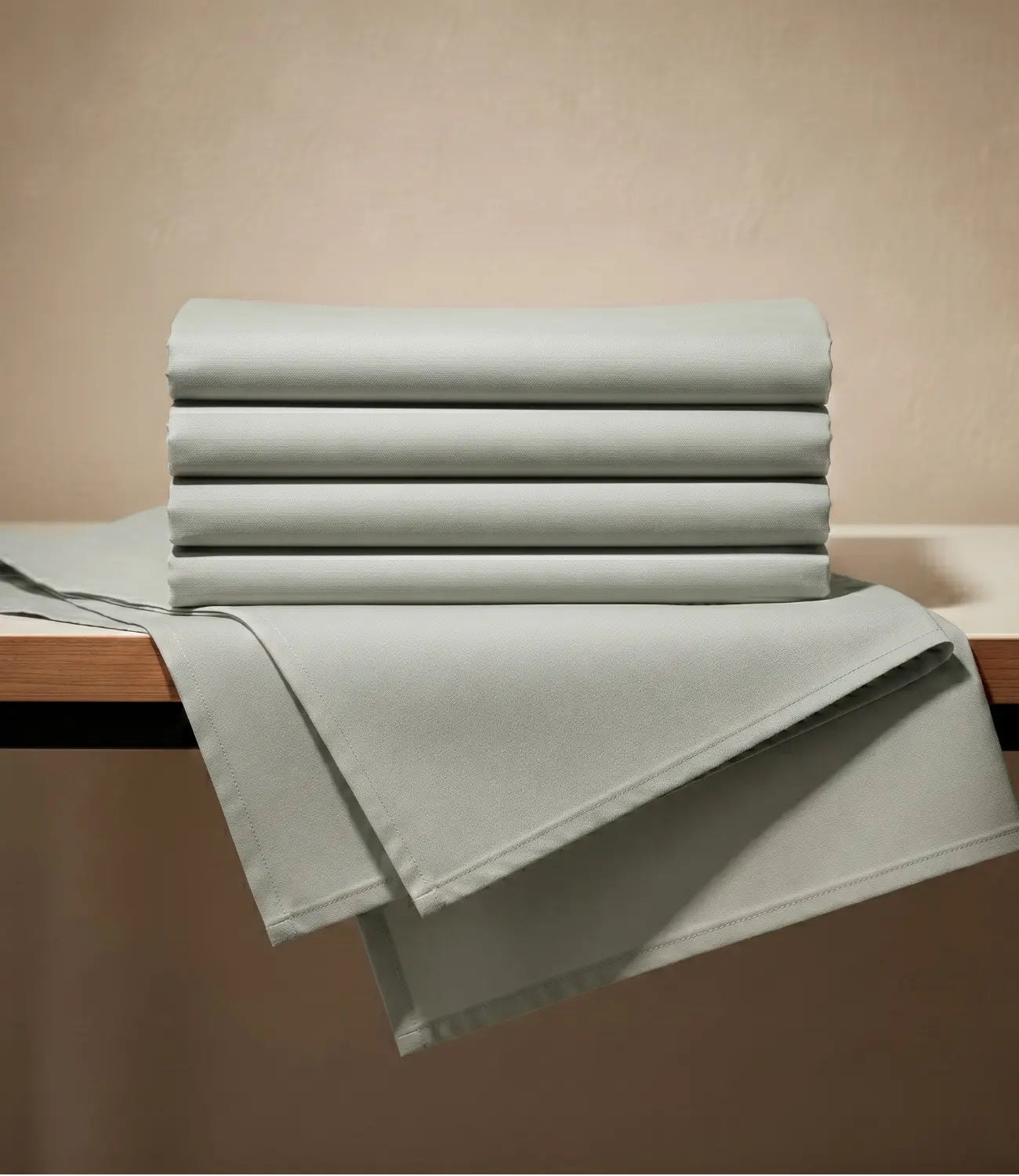 Folded mint green king size cotton bedsheet displayed with crisp edges, emphasizing its lightweight, breathable fabric, smooth texture, and premium finish for everyday comfort.