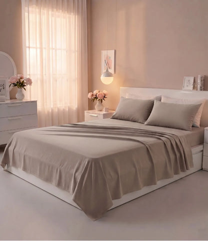 Premium king size 100% pure cotton mocha solid bedsheet with matching pillow covers, styled in a modern luxury bedroom featuring a soft earthy tone, breathable fabric, and elegant minimalist décor.