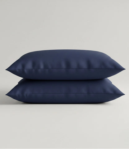 Set of two Soft Heaven navy blue cotton pillow covers for king size bedding, featuring a soft, breathable fabric with a smooth, luxurious finish.