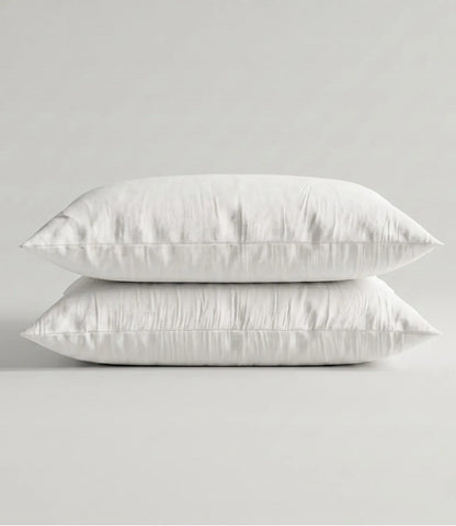 Matching 100% pure cotton white solid pillow covers featuring breathable fabric, premium stitching, soft texture, and elegant minimalist styling.