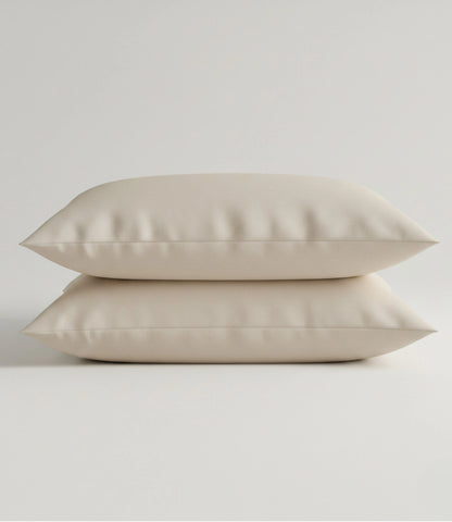 Pair of Soft Heaven pearl white cotton pillow covers for king size bedding set, crafted from soft breathable fabric with a smooth premium finish.