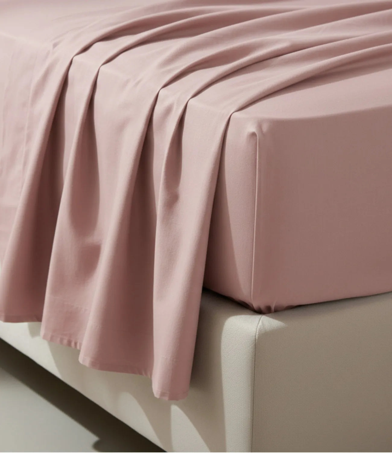 Close-up of Soft Heaven rose gold king size cotton bedsheet showing smooth breathable fabric, elegant drape, fine stitching, and premium quality finish.