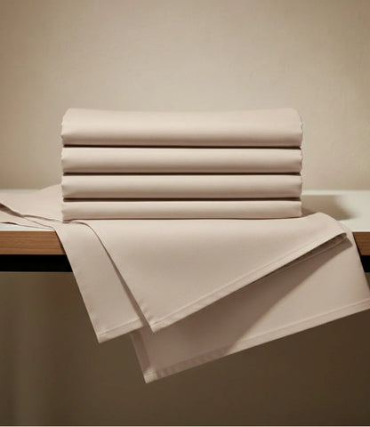 Neatly folded Soft Heaven smoke grey king size cotton bedsheet showcasing premium fabric quality and smooth finish.